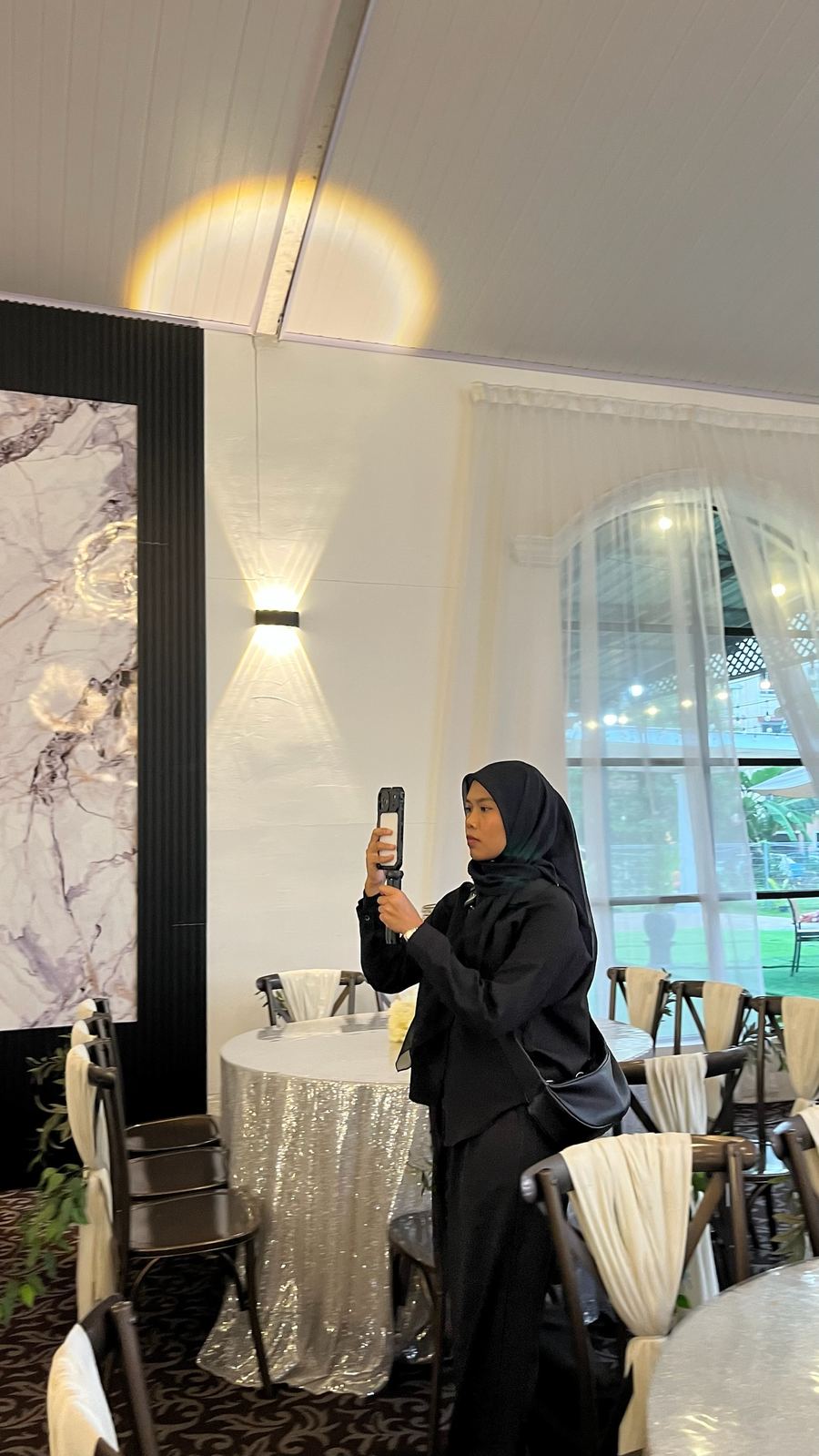 Fitrah filming the dewan before guests arrive